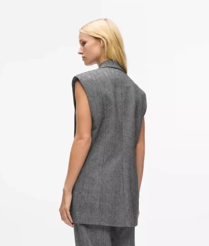 Tweed gilet met paillettenrevers